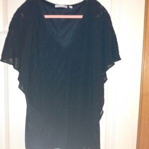 Notations: Womans black V neck lined blouse. Size XL.
